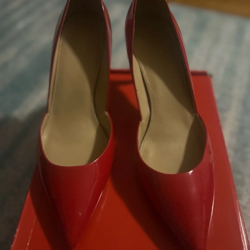 Michael Kors Red Heels Elegant Design
